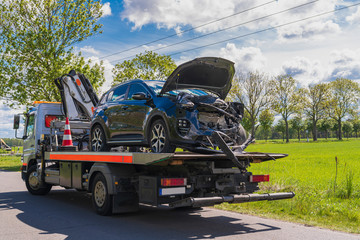 M1 Scrap Car Buyers collection truck picking up a vehicle